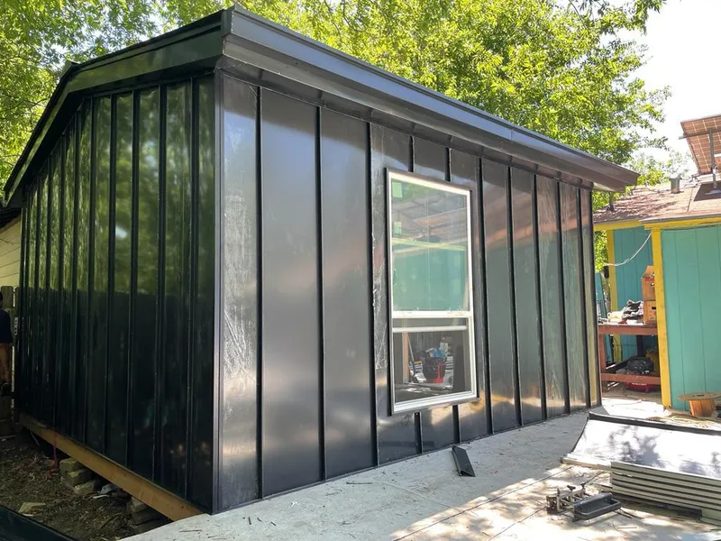 Black standing seam metal wall panels for Metal Roof Installation in Harrietstown