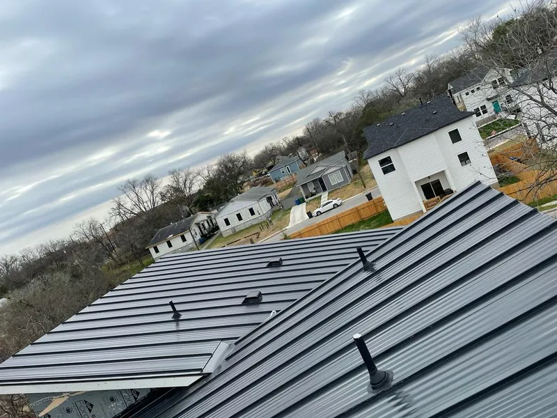 Standing seam metal roof panels with vents for Skylight Repair in Harrietstown